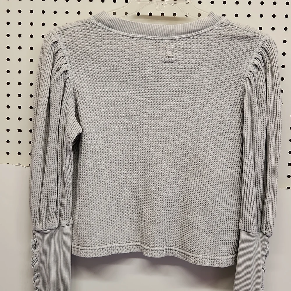 Free people waffle shirt women's size xs great condition.  Lace up long sleeves